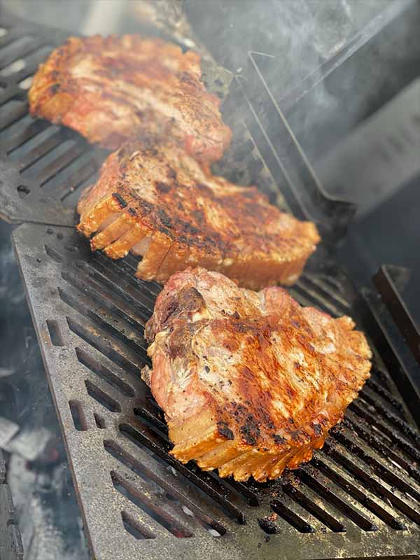 Pork Chops Cooking on a Sonic BBQ